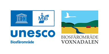Unescos och Biosfärområde Voxnadalens logotyper